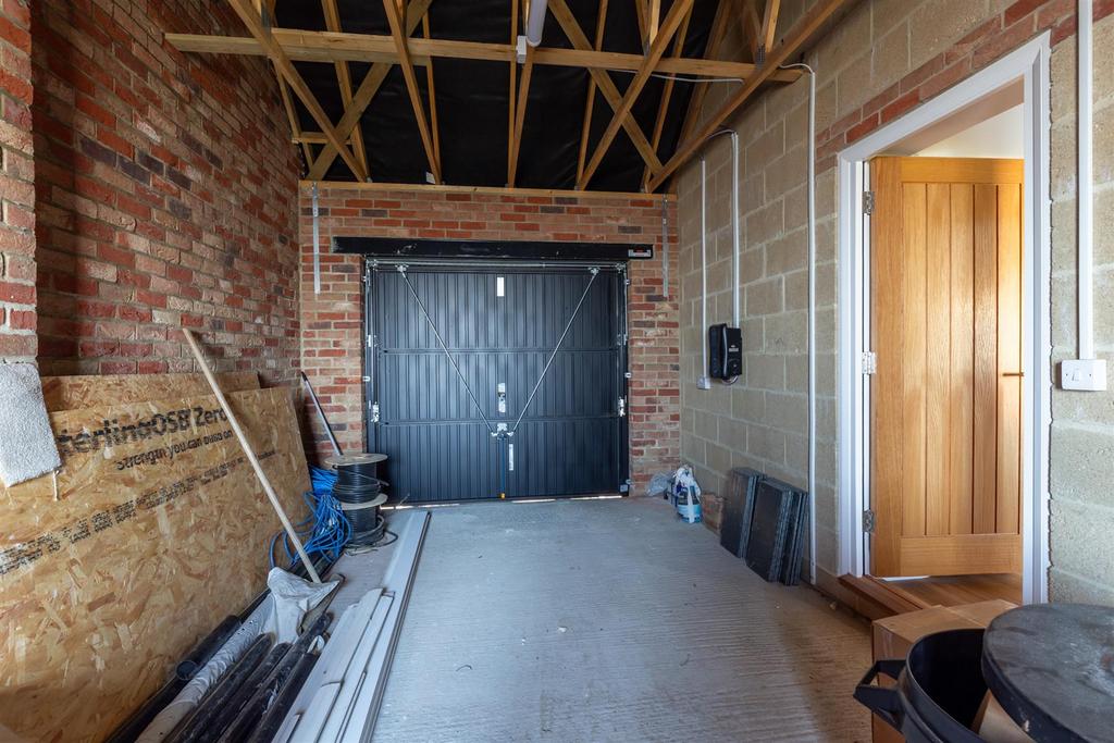 Garage with Electric Vehicle Charging Point