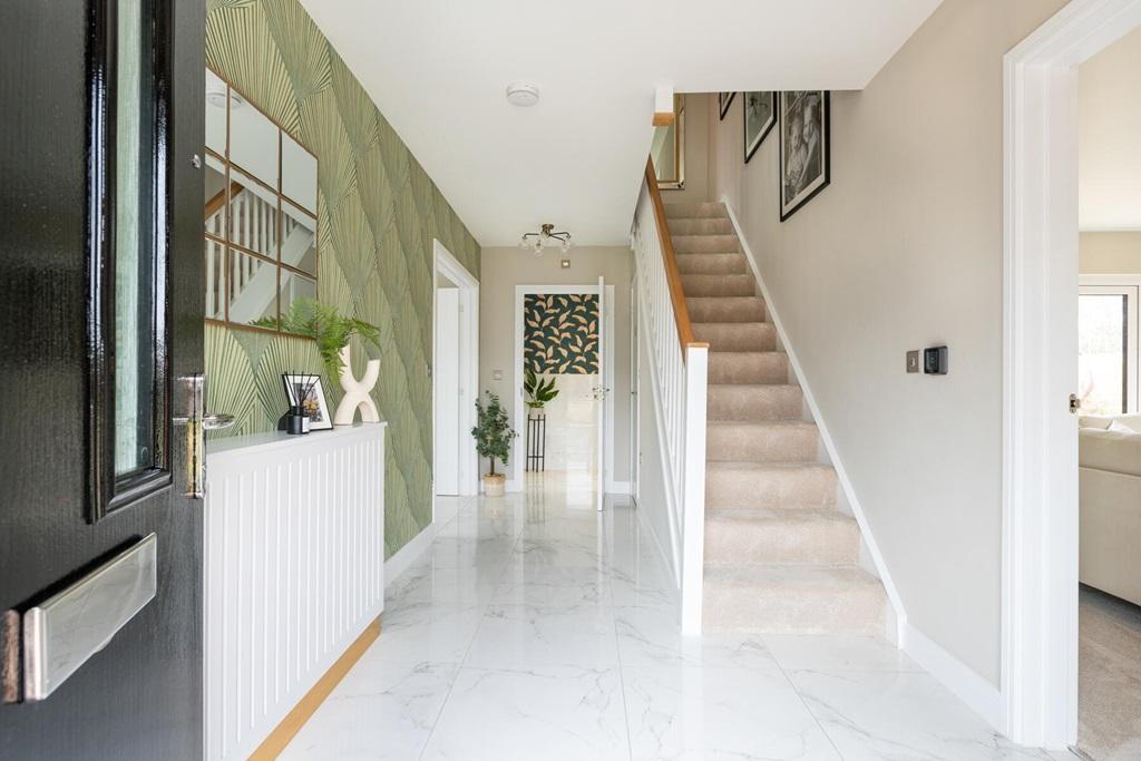 Welcoming hallway which is light and bright