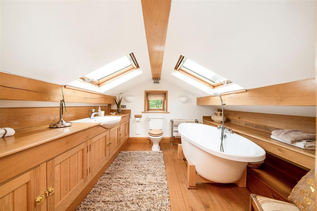 En suite bathroom to bedroom five