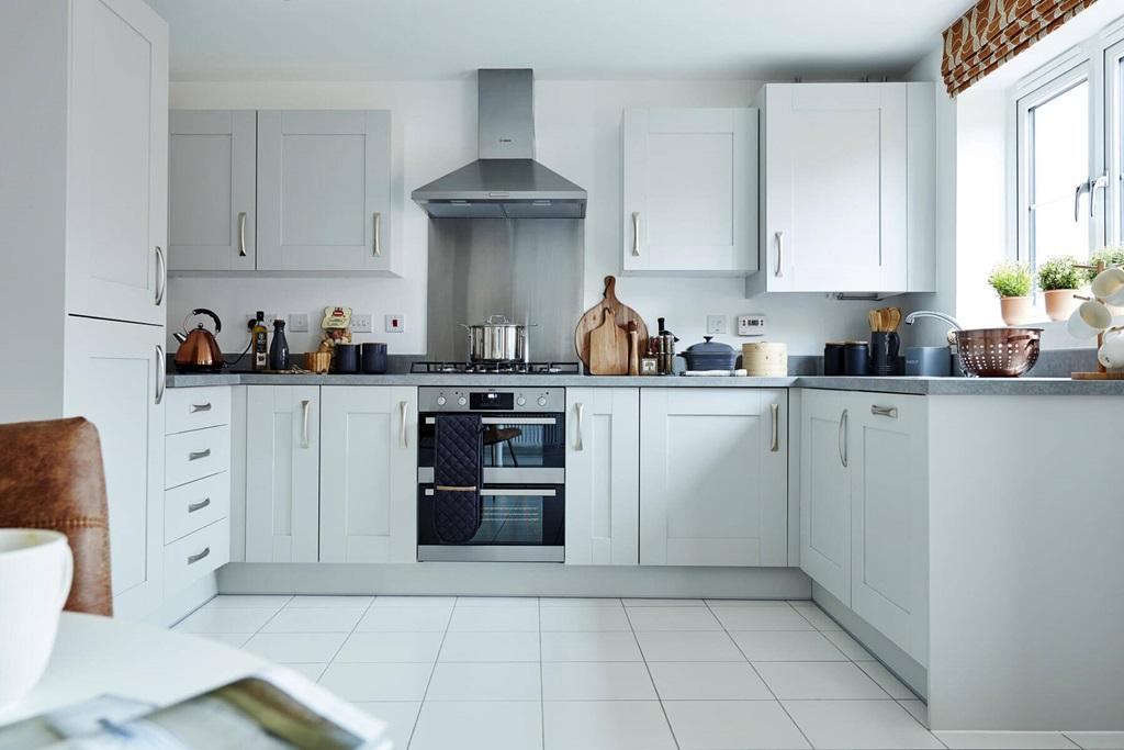 The kitchen offers a hub of the home with space...