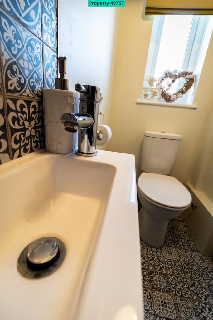 Downstairs WC 3' 4" x 6' 4" (1.02m x 1.93m)