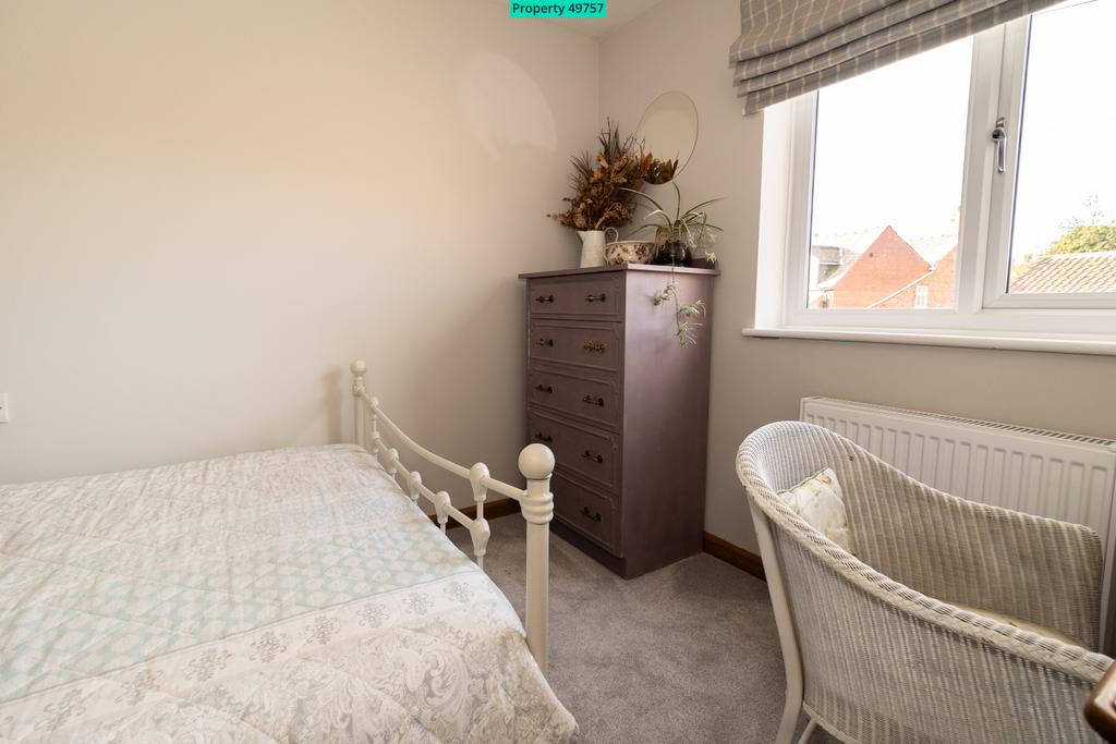 Bedroom 3  10' 8" x 8' 2" (3.25m x 3.25m)