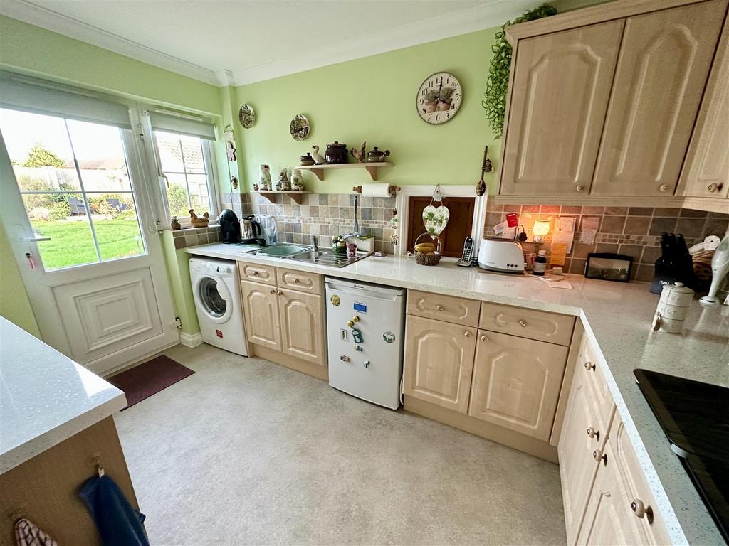 Kitchen with door to garden.JPEG