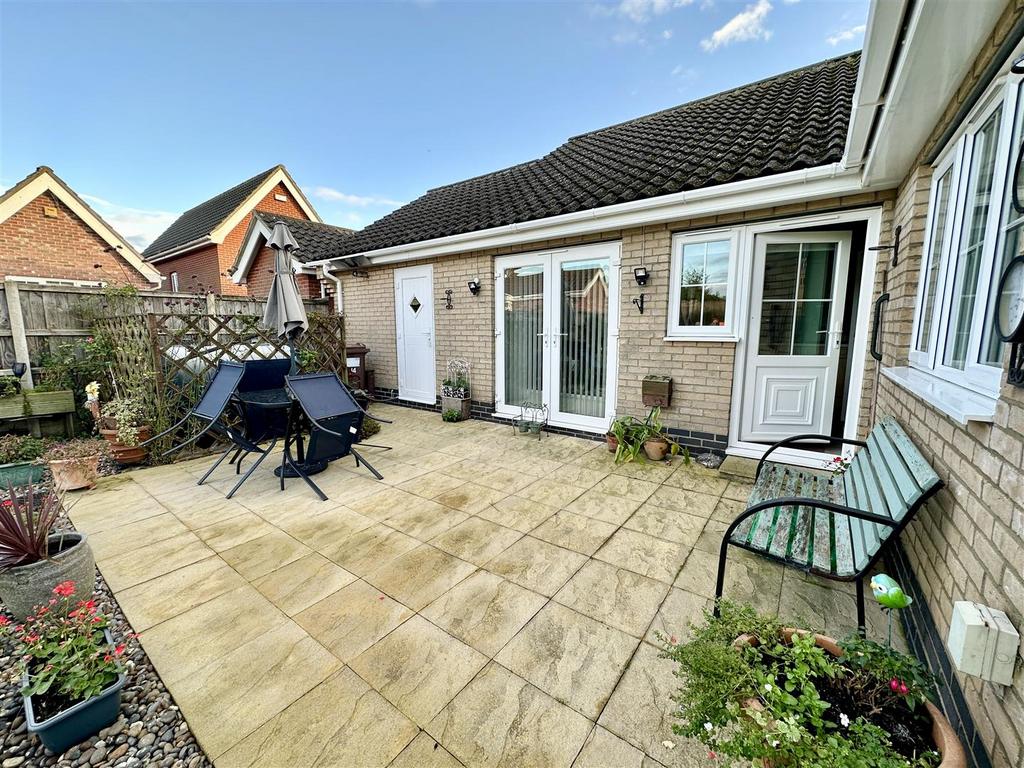Patio with access to garage.JPEG
