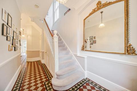23 Dunmore Road, London, SW20 8TN