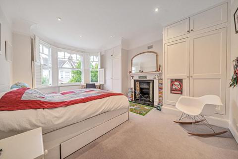 23 Dunmore Road, London, SW20 8TN