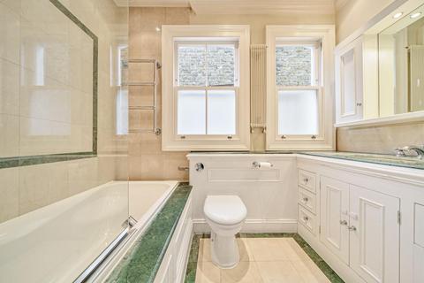 23 Dunmore Road, London, SW20 8TN
