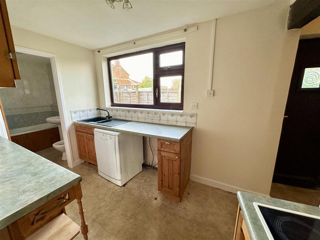 Kitchen with access to rear.JPEG