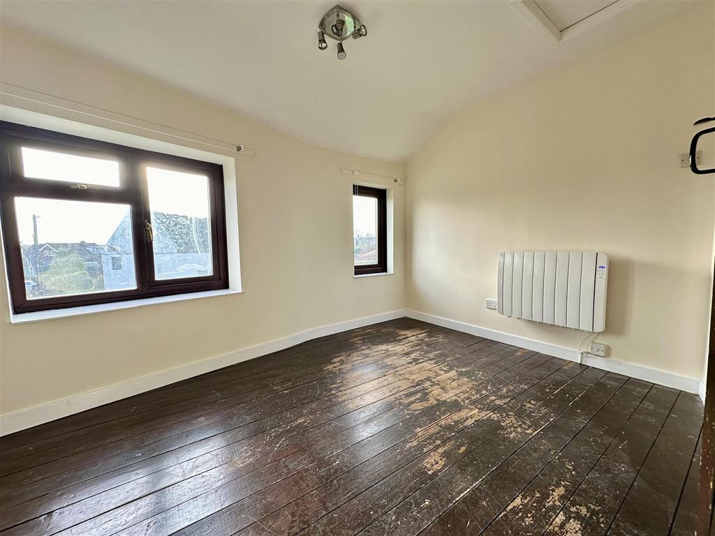 Bedroom two with front aspect.JPEG