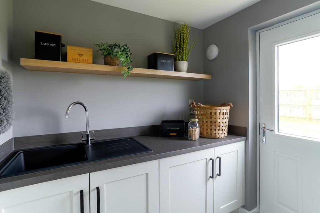 Handy utility room offer additional storage