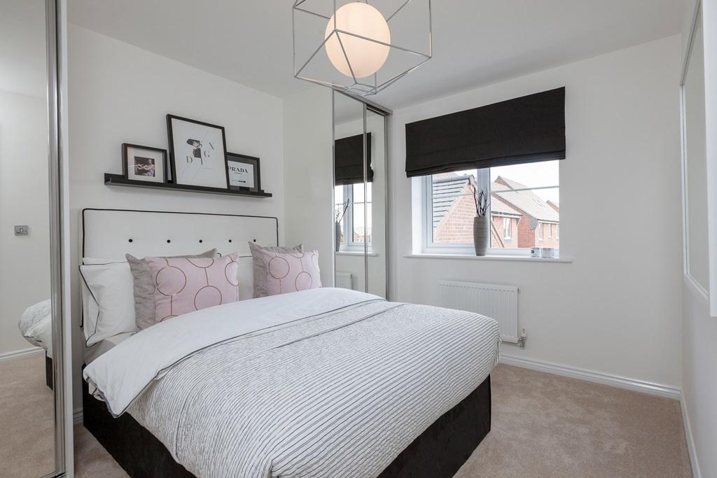 Wow guests with a sleek and stylish second bedroom