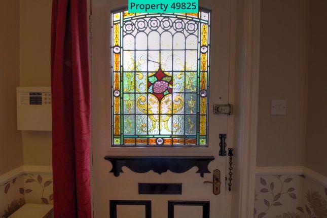 Front Door featuring original stained glass
