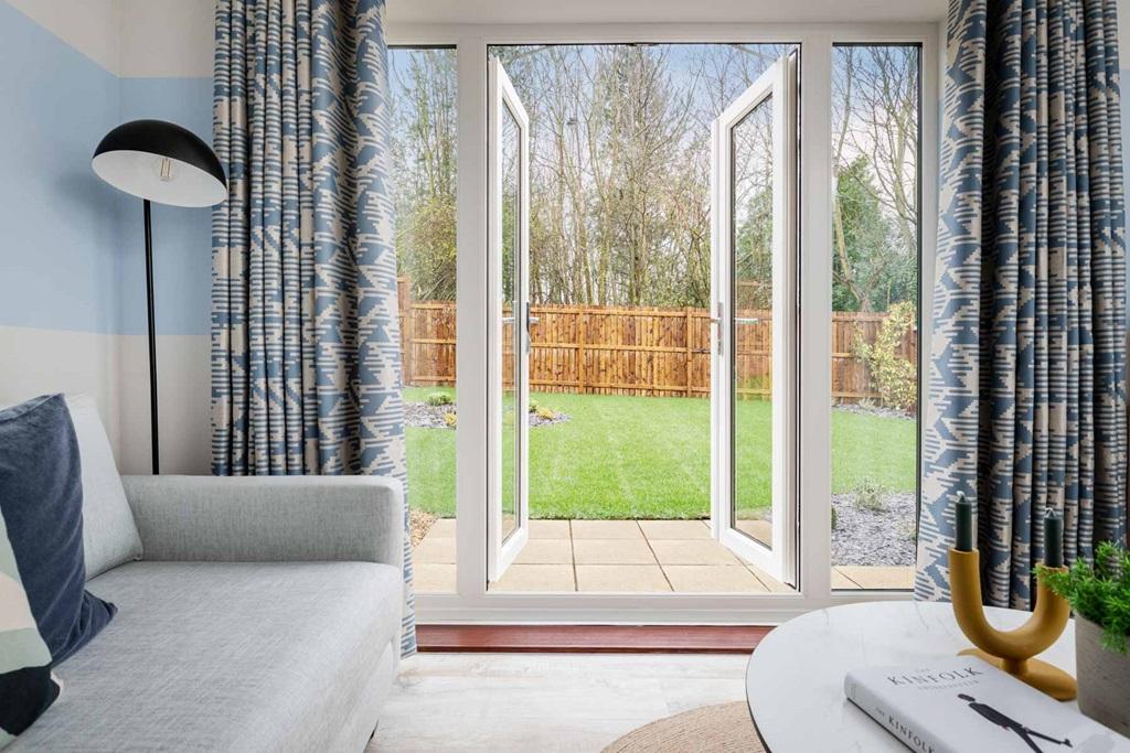 French doors open out to the garden, perfect on...