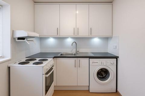 undefined, Veryan, Woking GU21