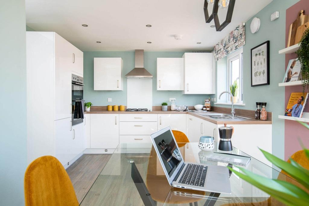 The bright and airy kitchen is perfect for...