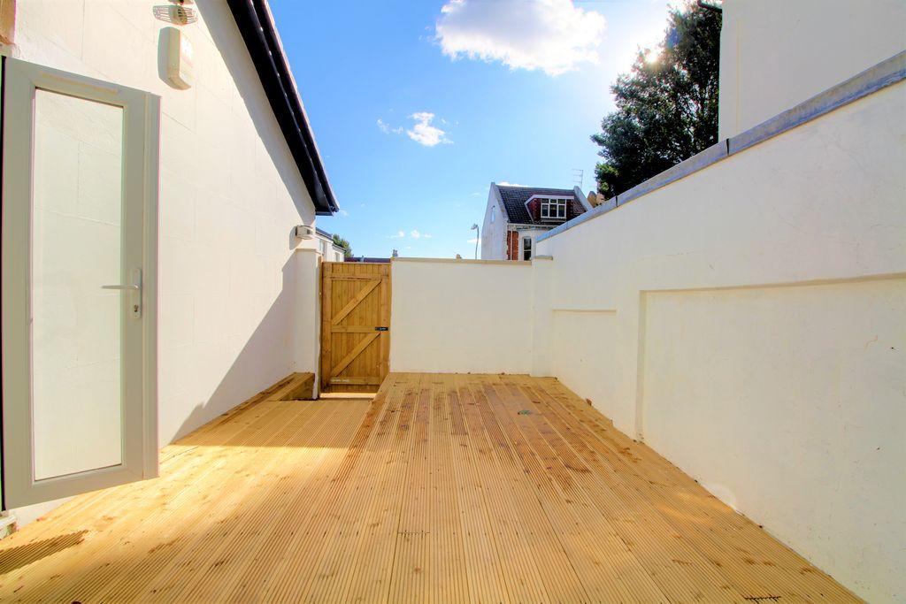 Private decked garden S + W facing