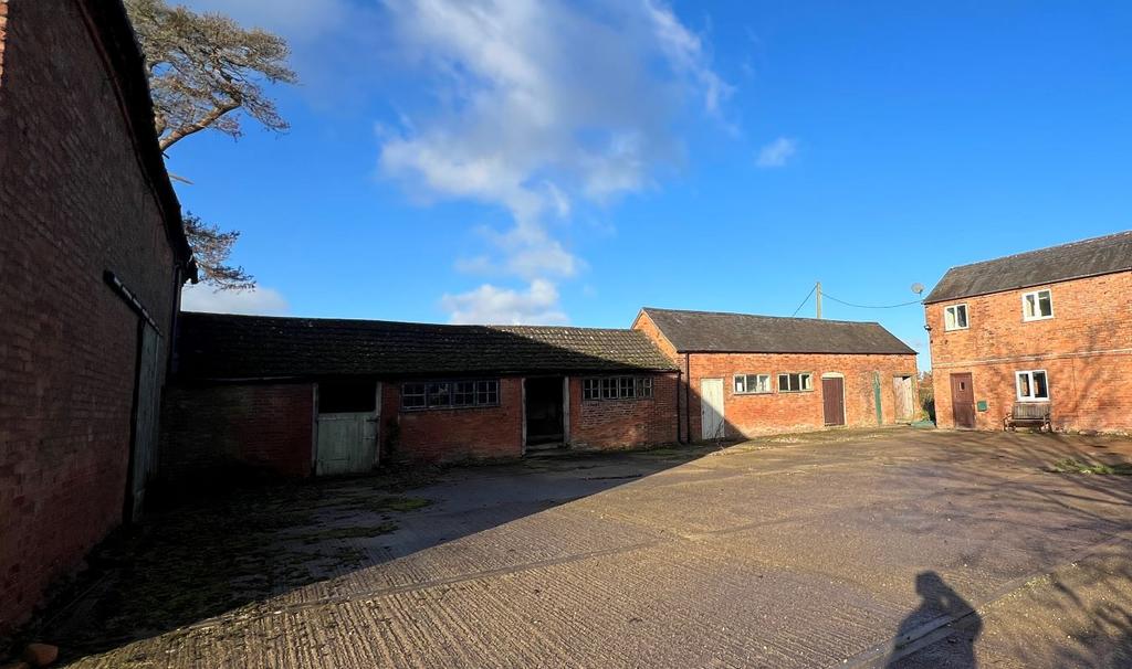 3 brick outbuildings