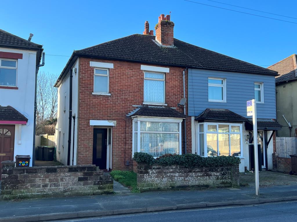 Semi detached house with brick front elevation and