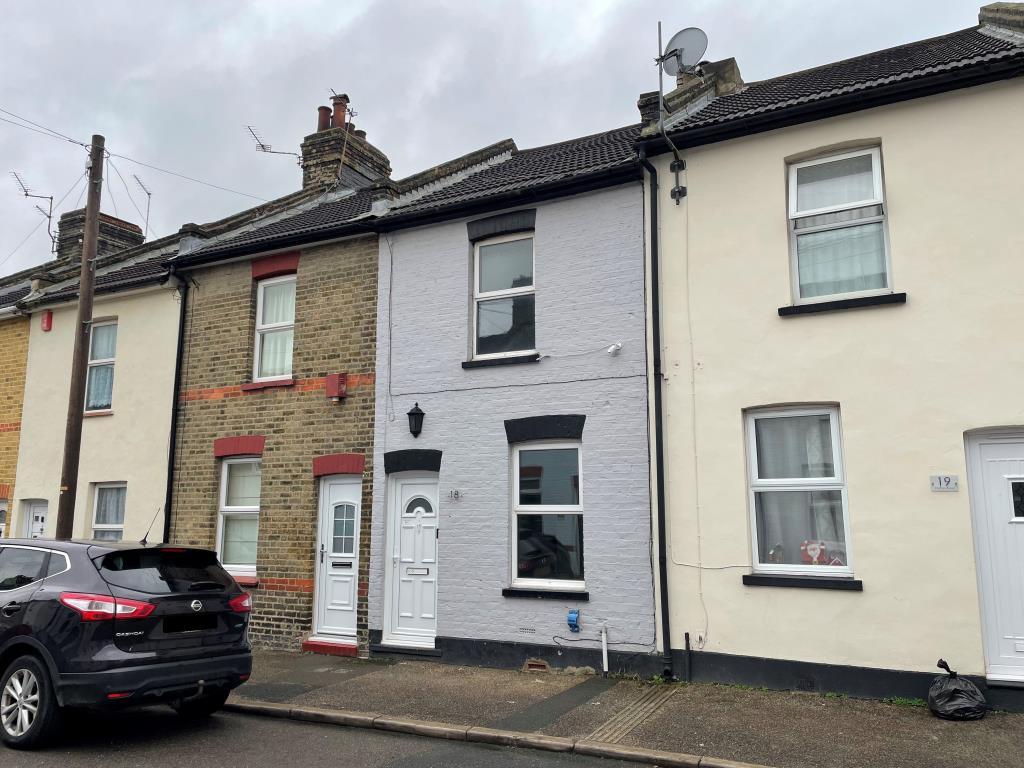 Mid terrace house with painted front