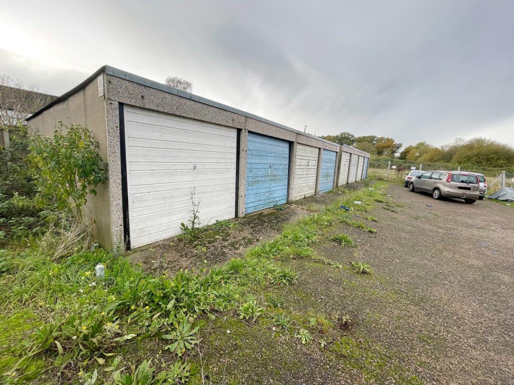 Garages looking left to right 2 in the nearest blo