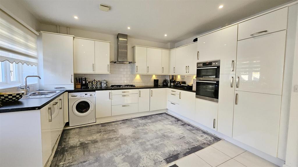 Kitchen (Rugs over tiles)