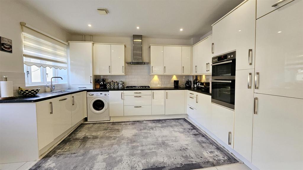 Kitchen (Rugs over tiles)