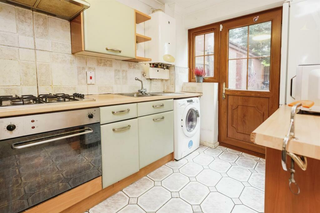 18 greetville close frontage kitchen.jpeg