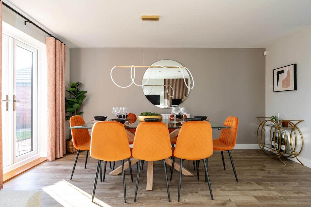 Double doors lead from the dining area to the...