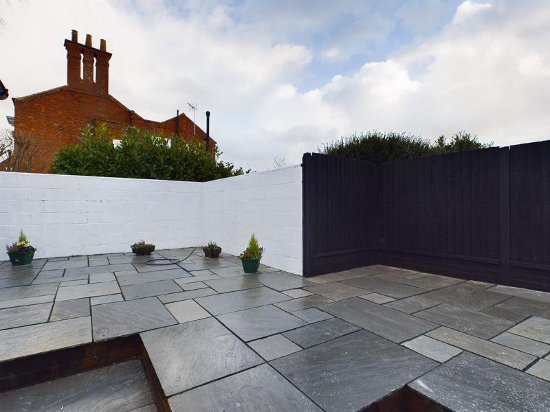 Rear paved courtyard