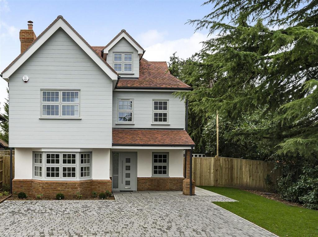 Front of house cropped V2.jpg