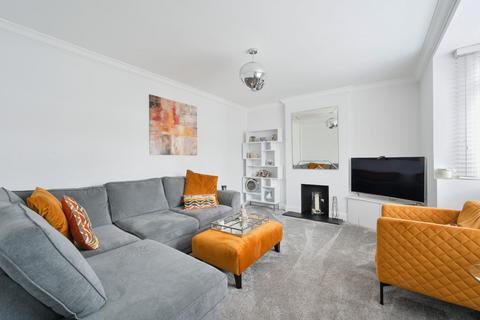 1 Belfield Road, Epsom, KT19 9TF
