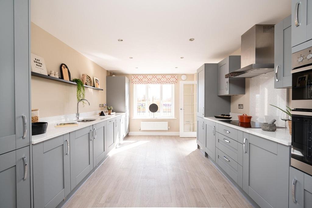 The modern kitchen offers plenty of worktop and...