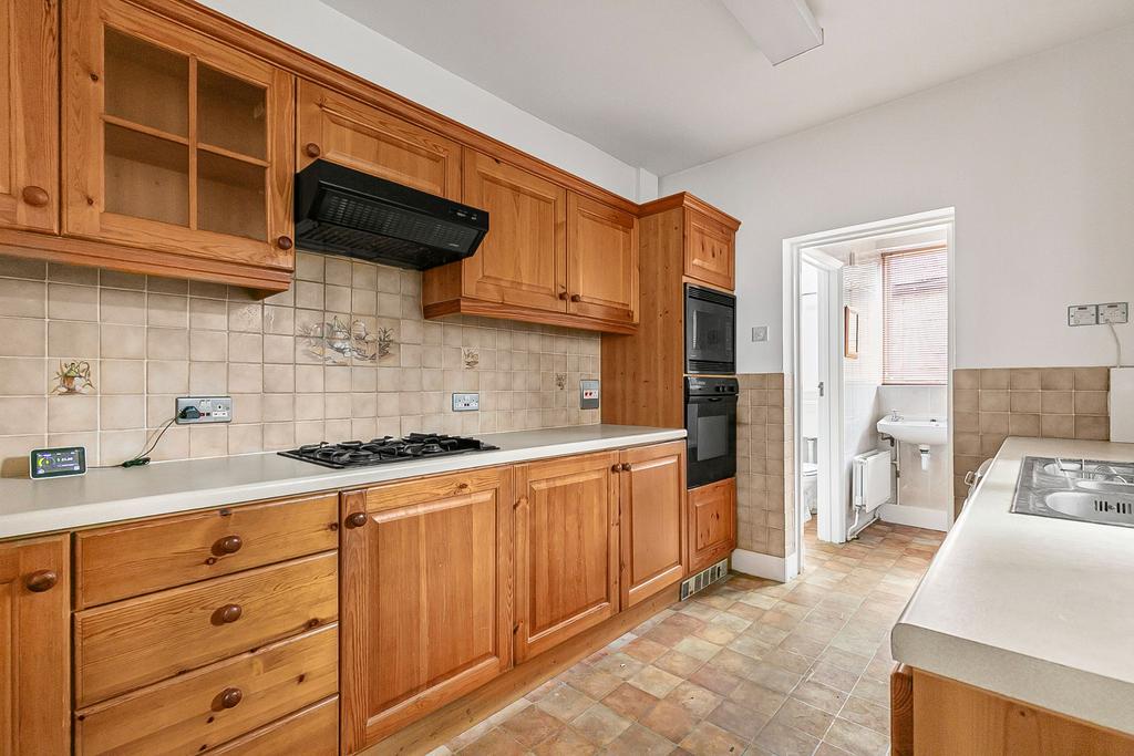 Kitchen of No.99a Leading to Bathroom