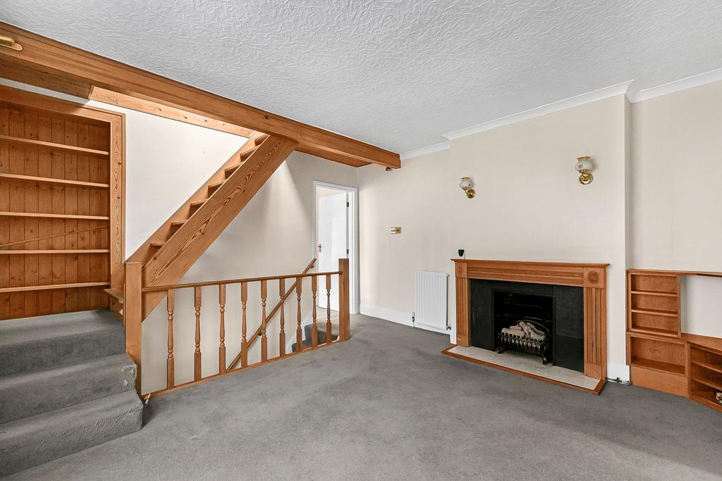 No.99a Living Room showing Stairs to Loft Room