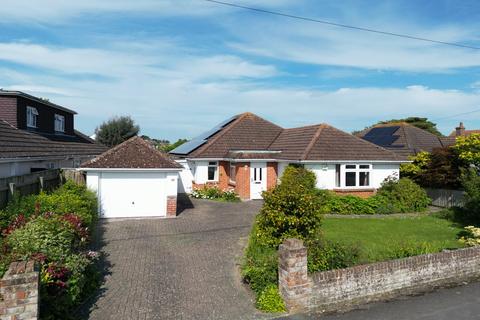 3 bedroom detached bungalow for sale, Sea Road, Barton On Sea, New Milton, Hampshire. BH25 7NG