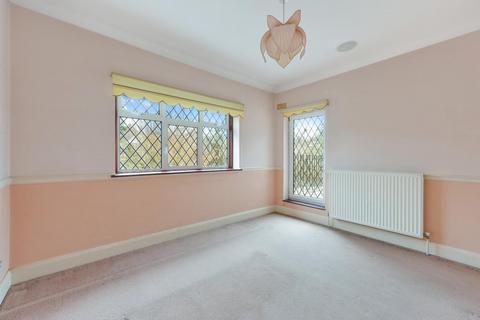 14 Warren Road, Banstead, SM7 1LA
