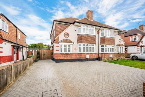 104 Walsingham Gardens, Epsom, KT19 0ND
