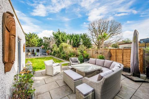 104 Walsingham Gardens, Epsom, KT19 0ND
