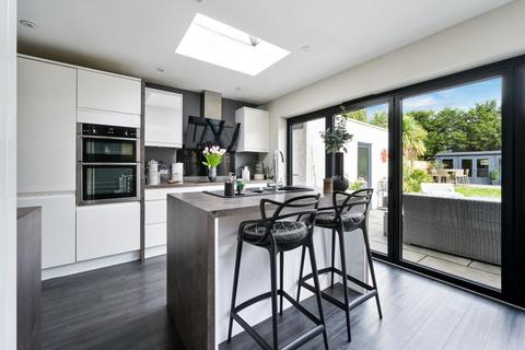 104 Walsingham Gardens, Epsom, KT19 0ND