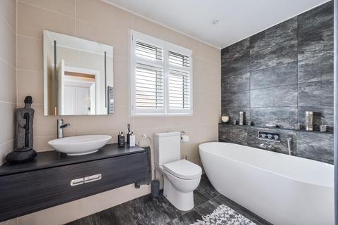 104 Walsingham Gardens, Epsom, KT19 0ND