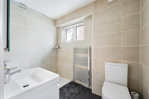 104 Walsingham Gardens, Epsom, KT19 0ND