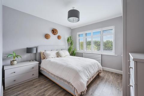 104 Walsingham Gardens, Epsom, KT19 0ND