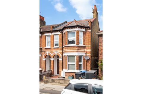 68a Quicks Road, London, SW19 1EX