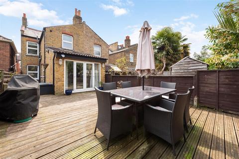 68a Quicks Road, London, SW19 1EX
