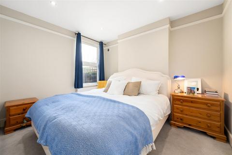 68a Quicks Road, London, SW19 1EX