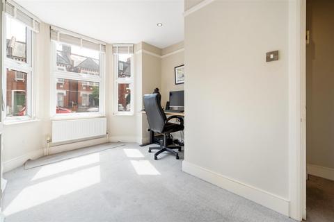 68a Quicks Road, London, SW19 1EX