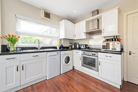 68a Quicks Road, London, SW19 1EX