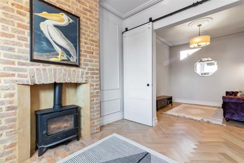 35 Quicks Road, London, SW19 1EY