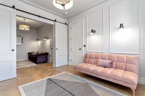 35 Quicks Road, London, SW19 1EY