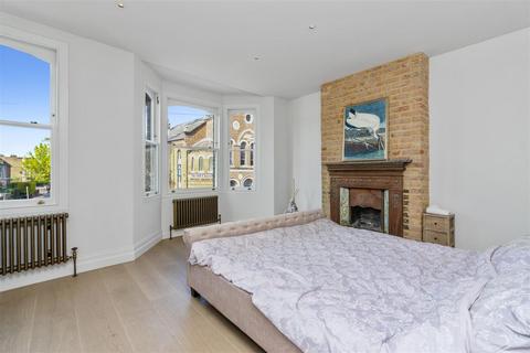 35 Quicks Road, London, SW19 1EY